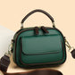 Elegant dobbeltlags crossbody-taske med bred rem