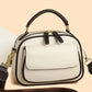 Elegant dobbeltlags crossbody-taske med bred rem