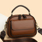 Elegant dobbeltlags crossbody-taske med bred rem