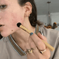 Farvet ler CC concealer til under øjnene