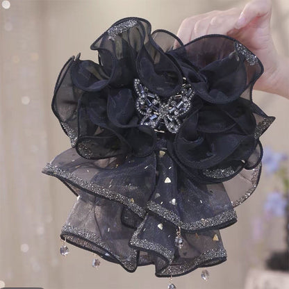 Hårspænde med flæset organza og sommerfugl